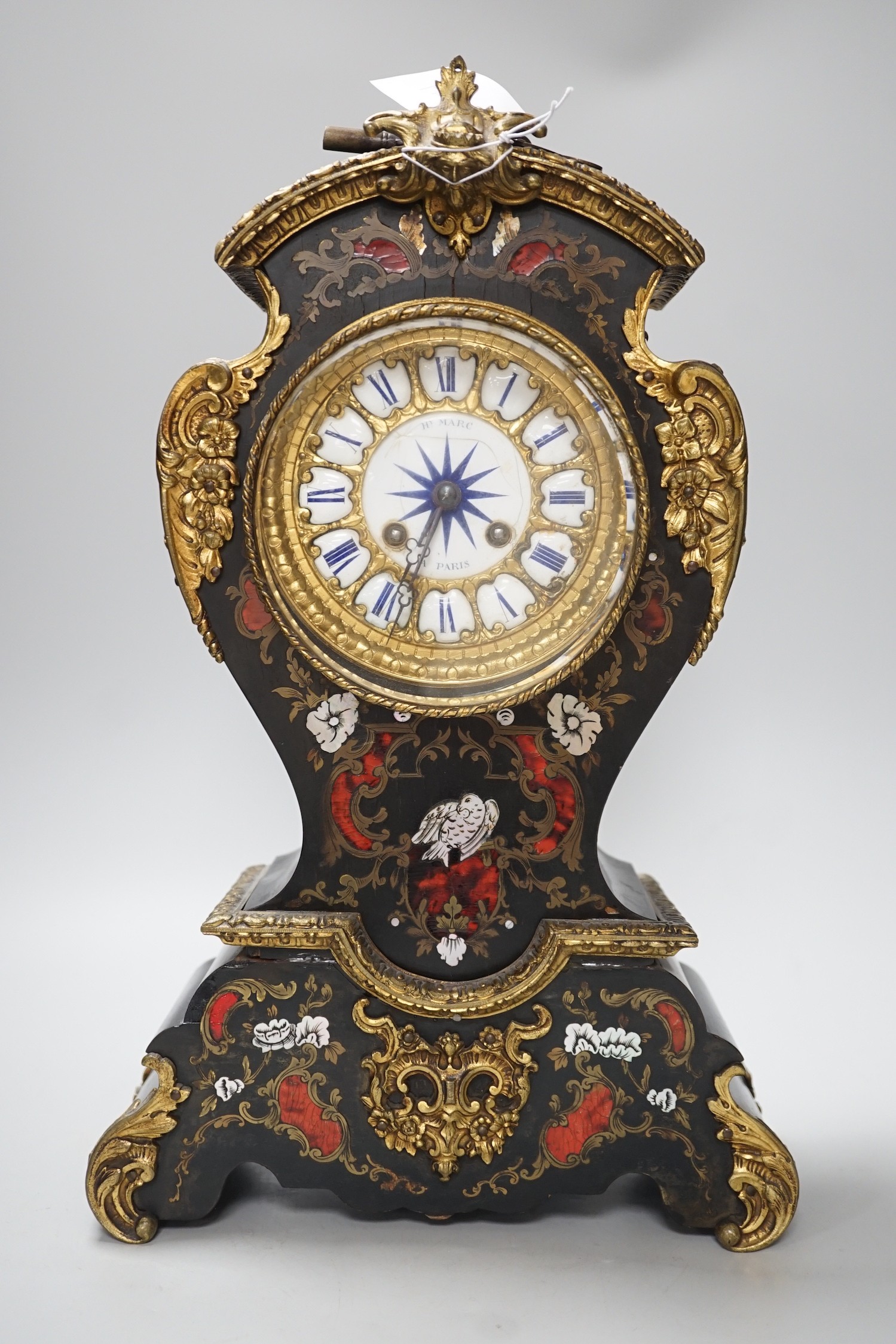 Henry Marc of Paris - A late 19th century French Louis XV style ormolu mounted boulle inlaid eight day mantel clock. (dial cracked), height 42cm